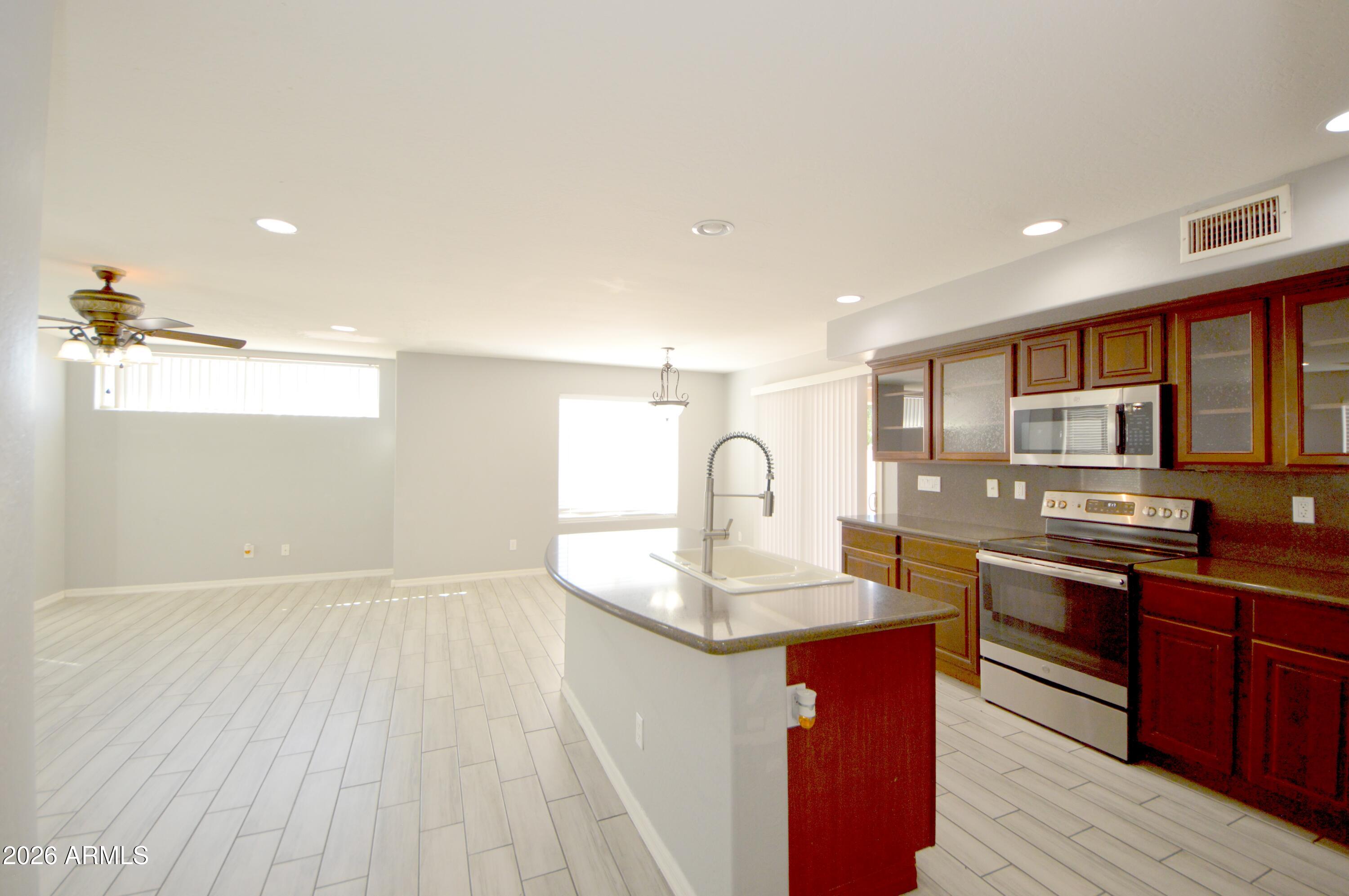 5115 West Novak Way Laveen, AZ 85339 - Photo 11 of 52 Kitchen & Family Room