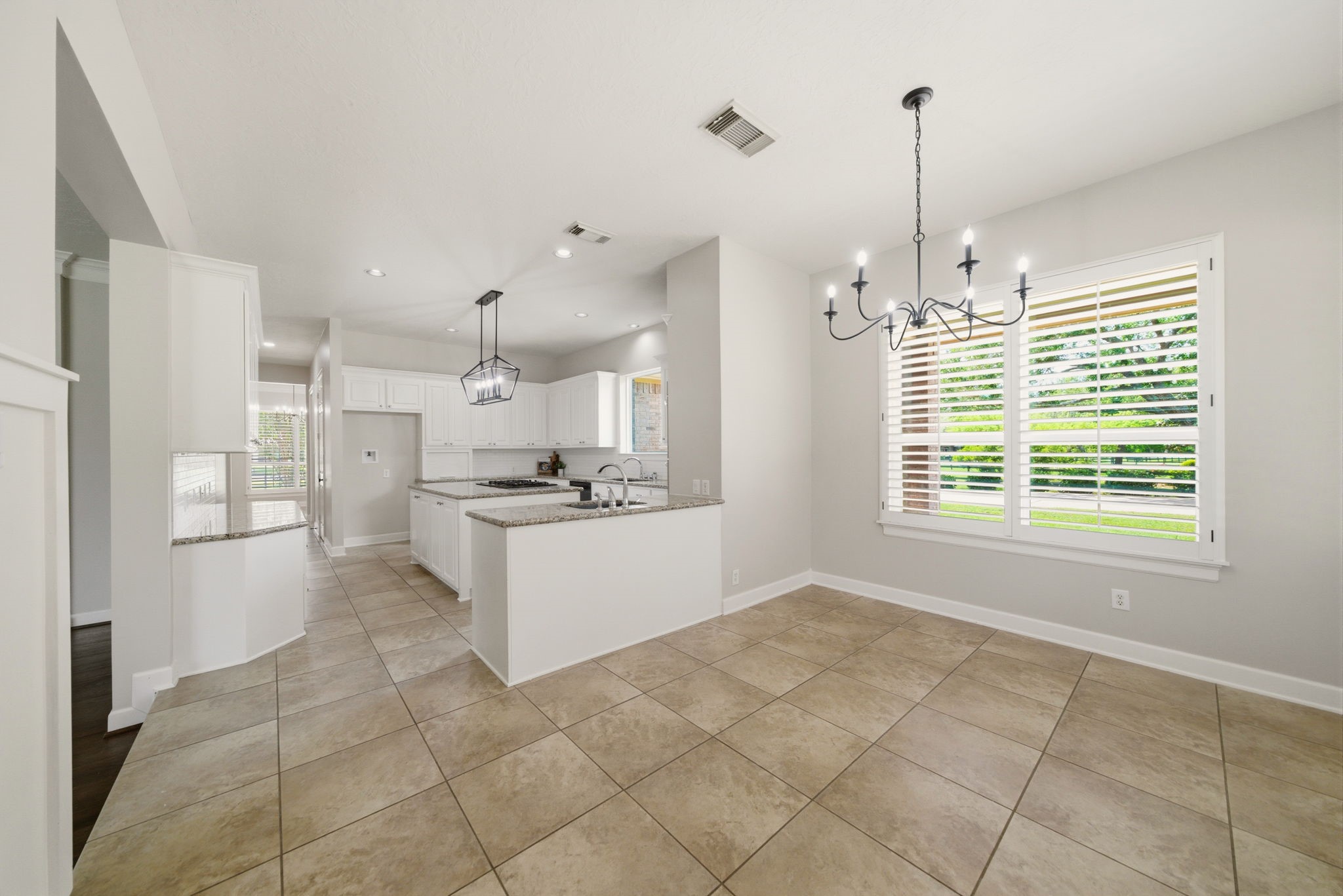 4535 Box Turtle Lane Fulshear, TX 77441 - Photo 18 of 49 Bright and sunny breakfast nook, filled with natural light and offering a warm, inviting space to start the day.