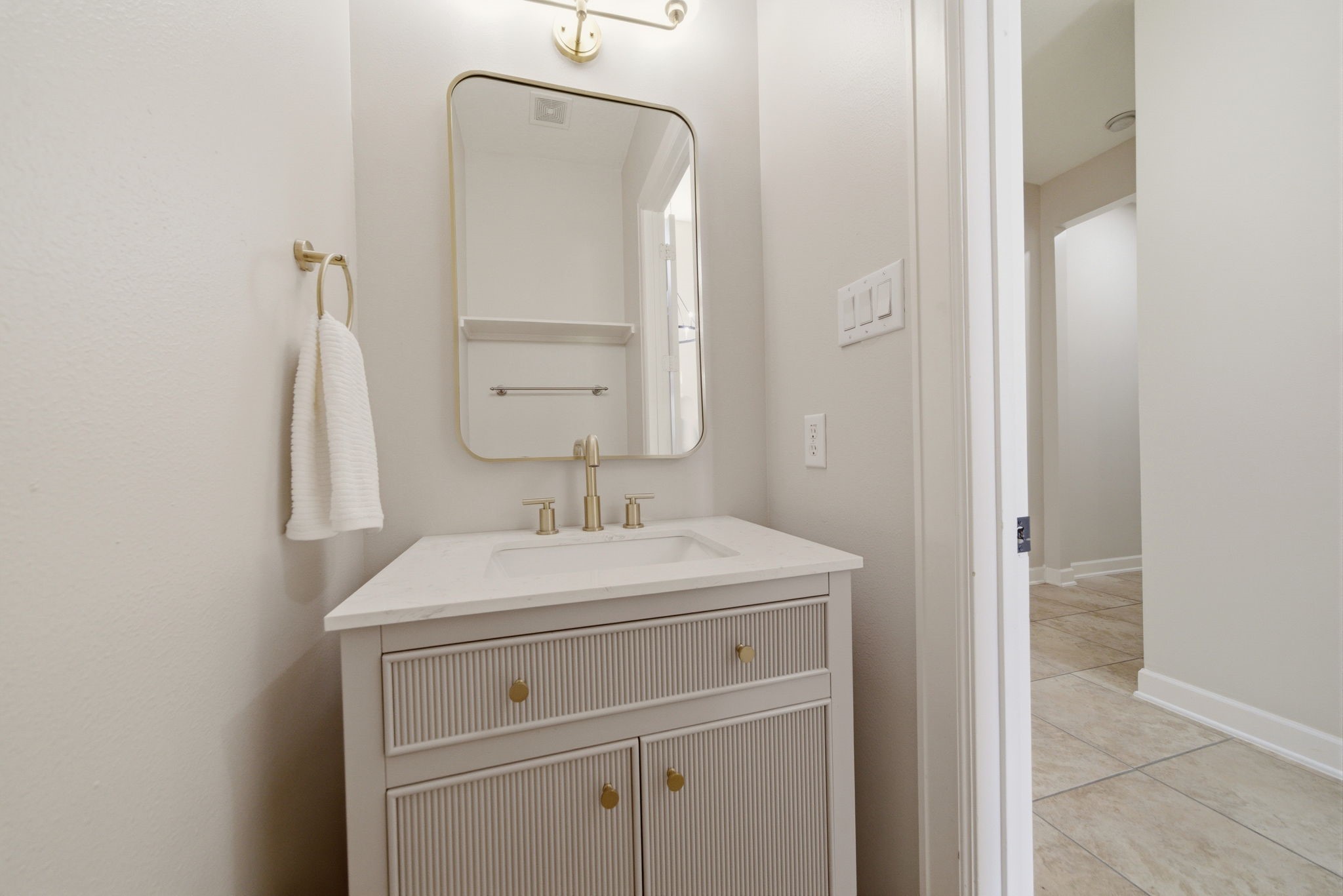 4535 Box Turtle Lane Fulshear, TX 77441 - Photo 24 of 49 Conveniently located downstairs half bath, ideally situated for easy access from main living areas and entertaining spaces.