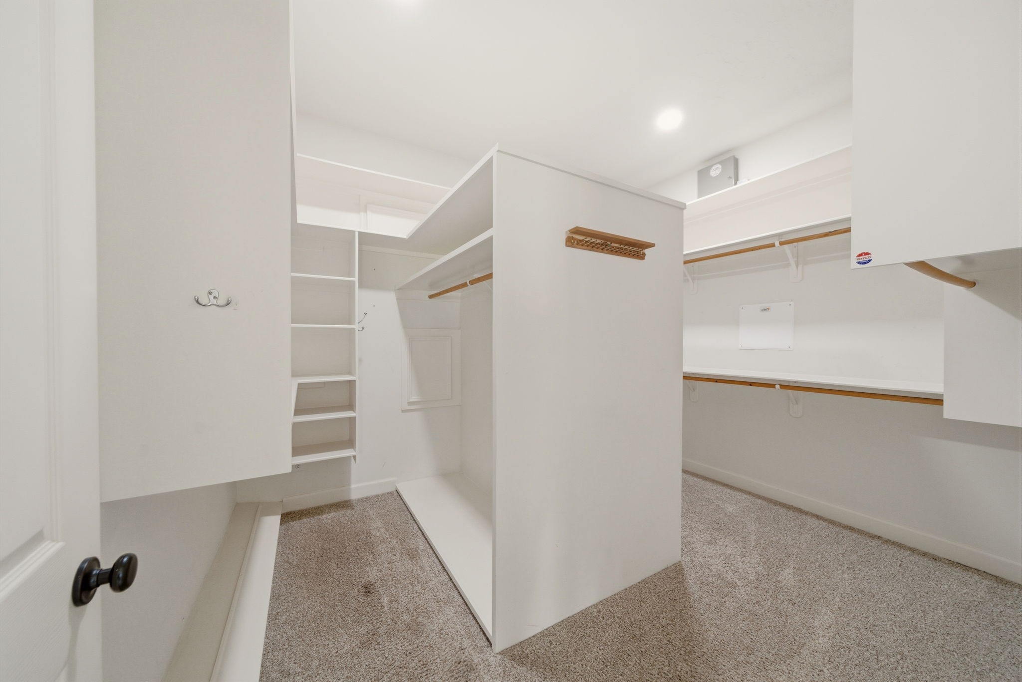 4535 Box Turtle Lane Fulshear, TX 77441 - Photo 30 of 49 Primary walk-in closet featuring custom built-ins and ample space for organized, comfortable storage.