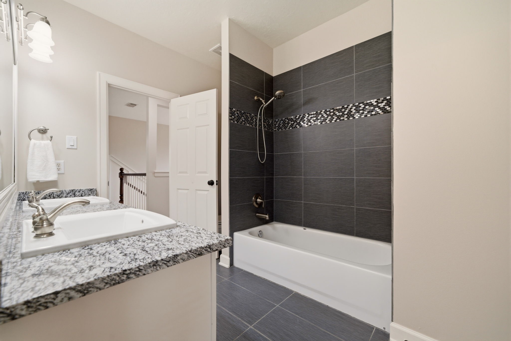 4535 Box Turtle Lane Fulshear, TX 77441 - Photo 36 of 49 Updated bathroom with dual sinks and modern finishes.