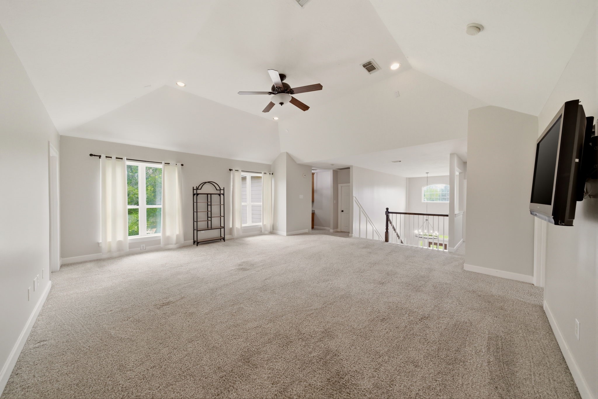 4535 Box Turtle Lane Fulshear, TX 77441 - Photo 39 of 49 Gameroom located at the top of the stairs, offering a versatile upstairs space for entertainment, play, or relaxation