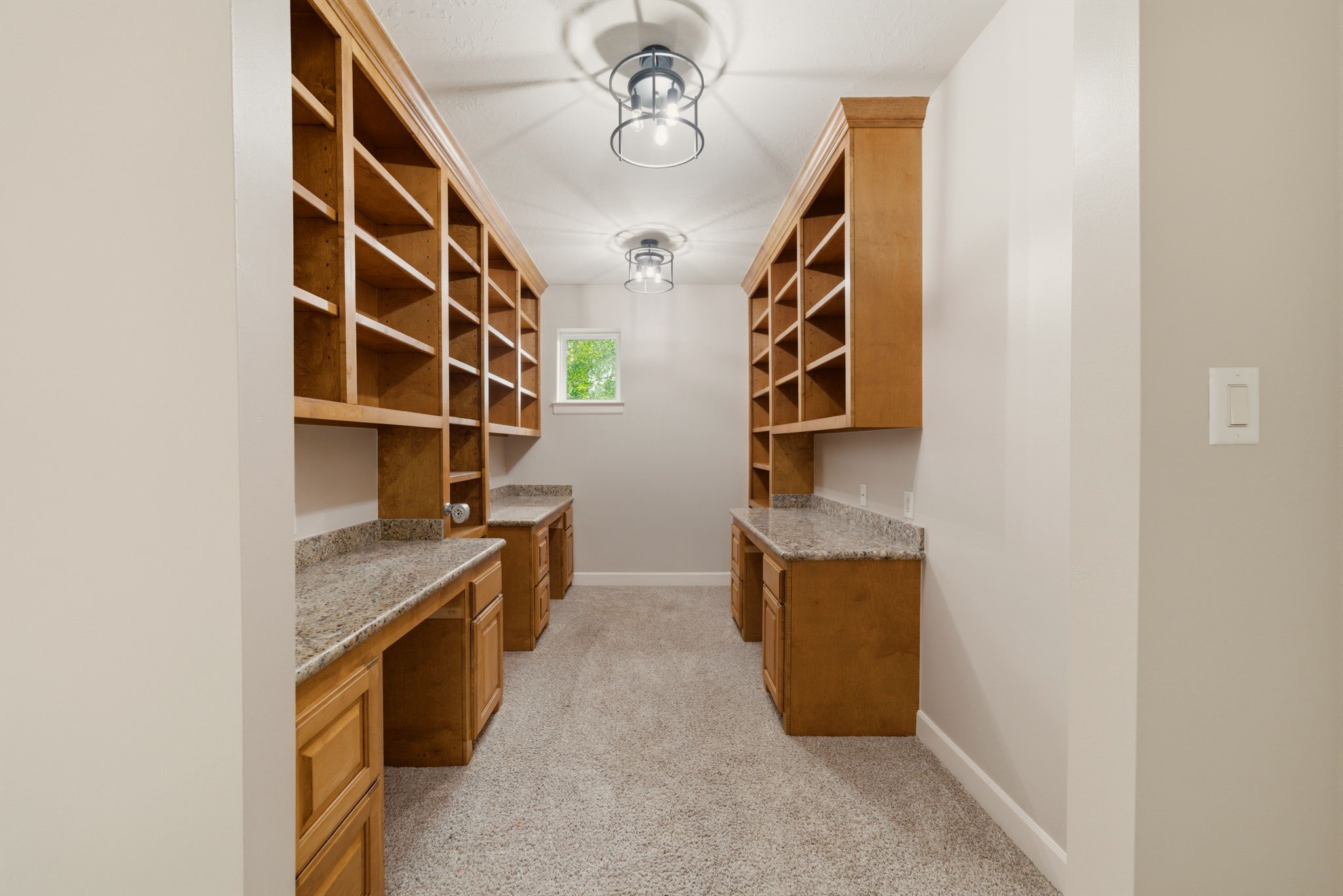 4535 Box Turtle Lane Fulshear, TX 77441 - Photo 41 of 49 The custom built-ins throughout this space create an ideal environment for projects, homework, or crafting!