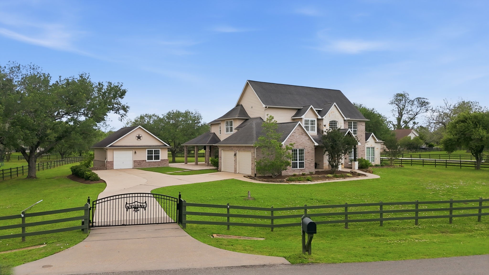 4535 Box Turtle Lane Fulshear, TX 77441 - Photo 10 of 49 Positioned on a desirable corner lot, the property features a complete fence line that enhances both security and curb appeal.