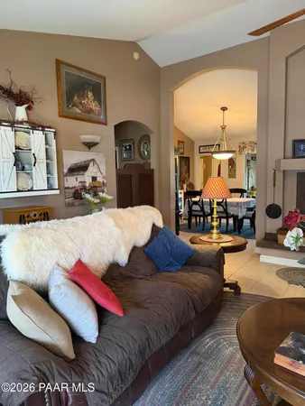 a living room with furniture and a couch