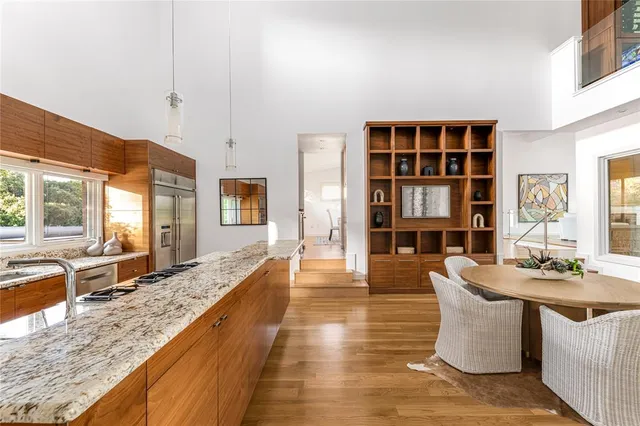 a large living room with large windows