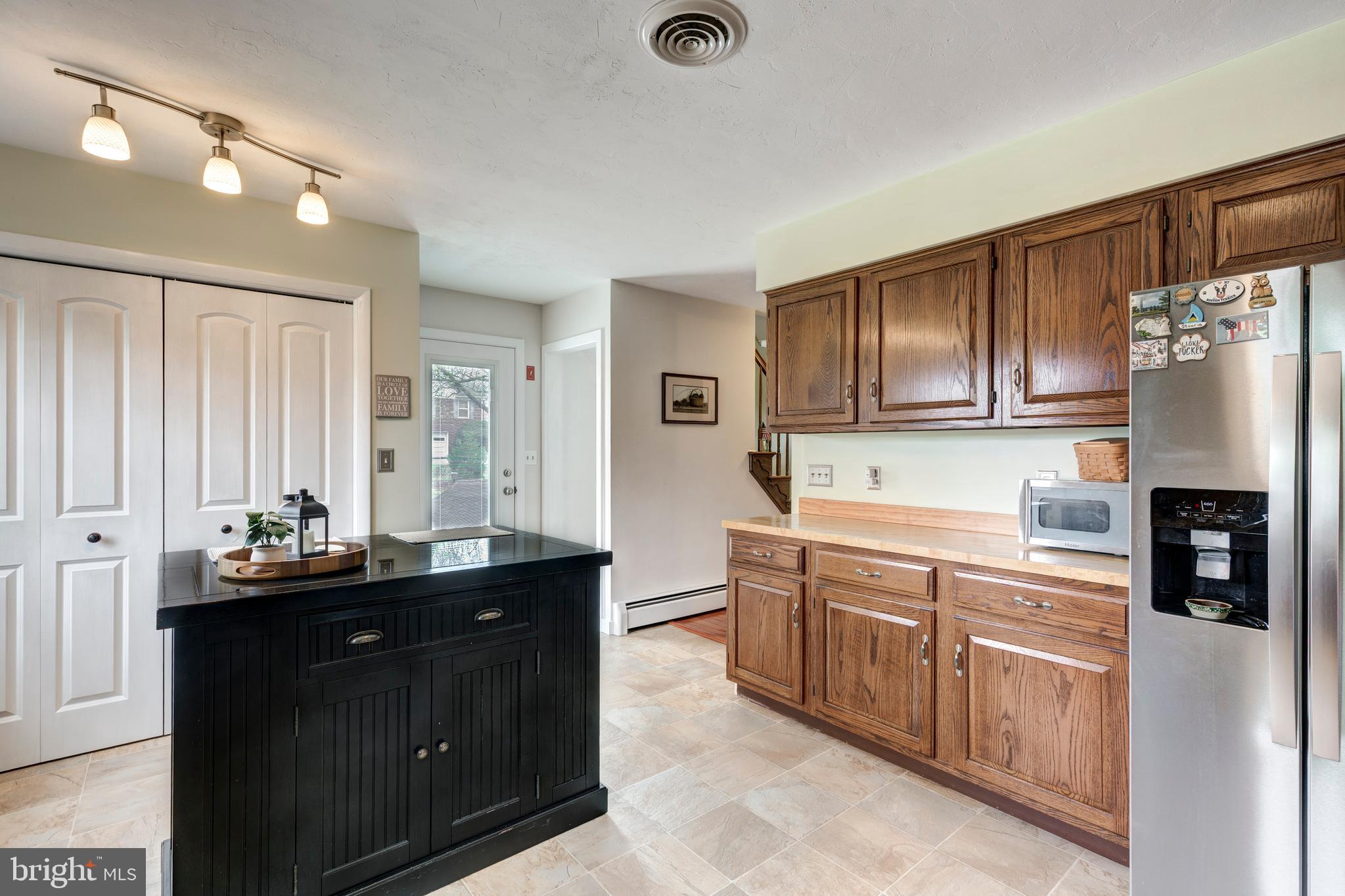 3144 Coon Club Road Hampstead, MD 21074 - Photo 26 of 64 a kitchen with stainless steel appliances granite countertop a sink and cabinets