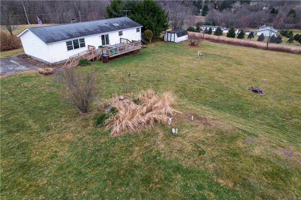 226 Rieger Road Butler, PA 16001 - Photo 6 of 23 a view of a swimming pool with lawn chairs and couches
