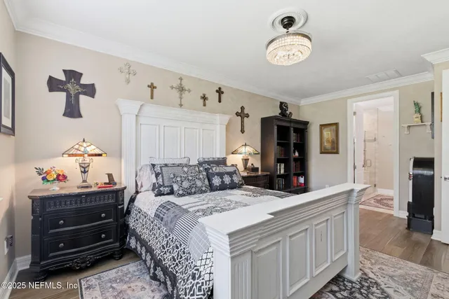 a bathroom with a tub a sink a mirror and a shower