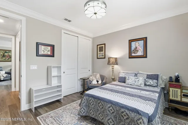 a kitchen with lots of clutter and cabinets
