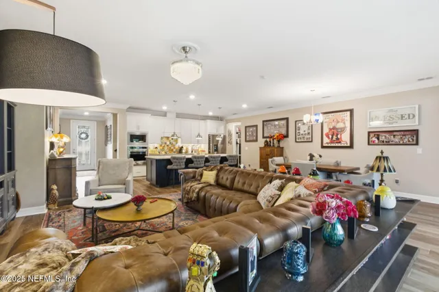 a bathroom with a double vanity sink toilet mirror and shower