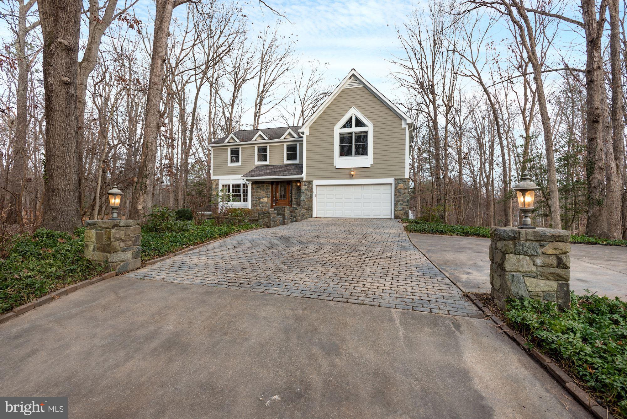 1839 Post Oak Trail Reston, VA 20191 - Photo 50 of 53 Front Ext. showing driveway