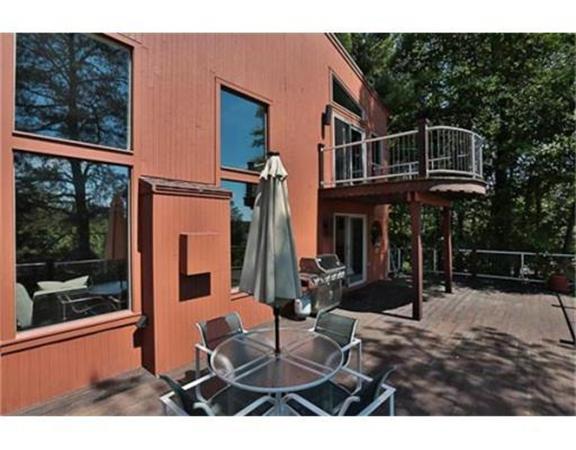 26 River Road Merrimac, MA 01860 - Photo 5 of 29 a backyard of a house with table and chairs