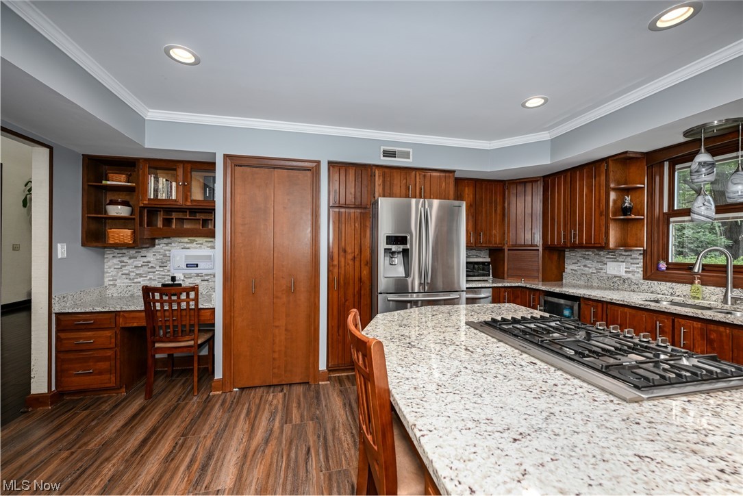 171 Granger Road, Unit 138 Medina, OH 44256 - Photo 6 of 31 A full pantry, an abundance of cabinet space and a built in desk offer plenty of room to meet any chef's storage and organizational needs.