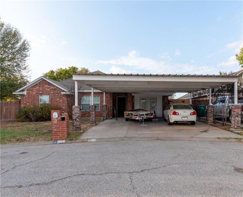 202 Eagle Point Court Waco, TX 76705 - Photo 2 of 14 a view of a car park in front of house