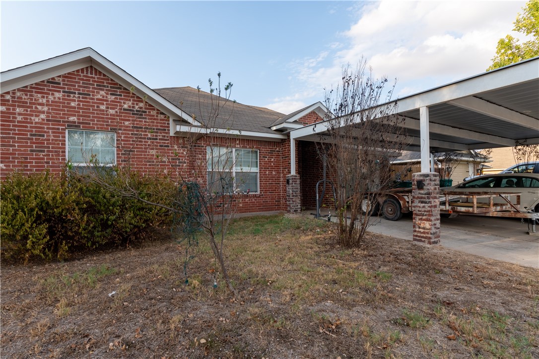 202 Eagle Point Court Waco, TX 76705 - Photo 3 of 14 a view of a house with backyard