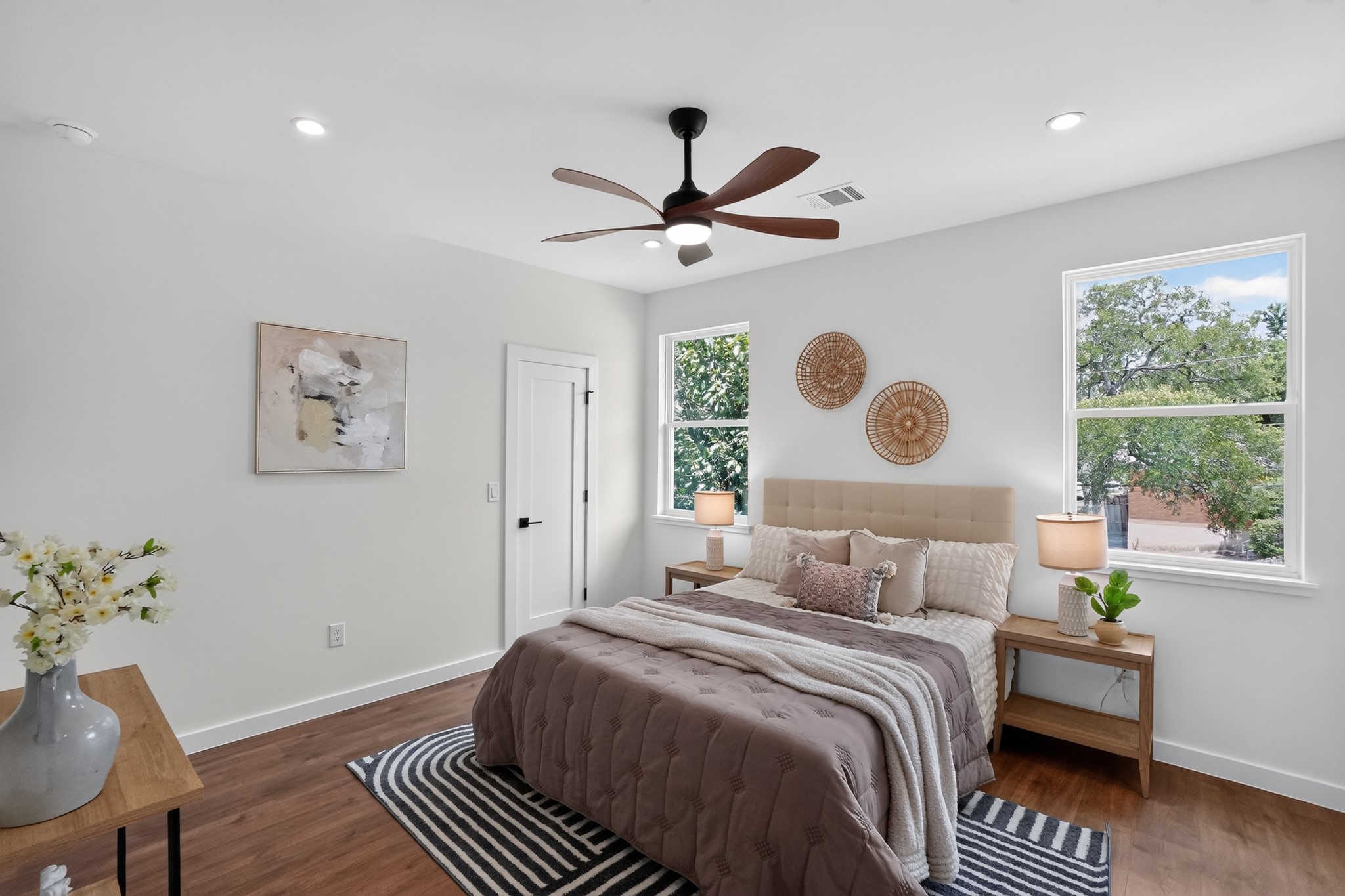 4200 Valley View Road, Unit B Austin, TX 78704 - Photo 19 of 33 a bedroom with a bed and a chandelier