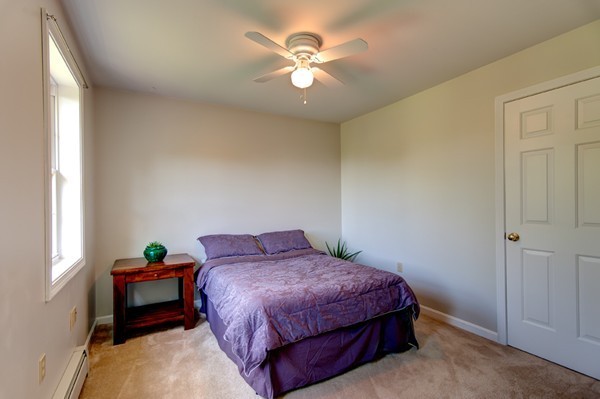858 Wauwinet Road Barre, MA 01005 - Photo 17 of 22 a bedroom with a bed and a window