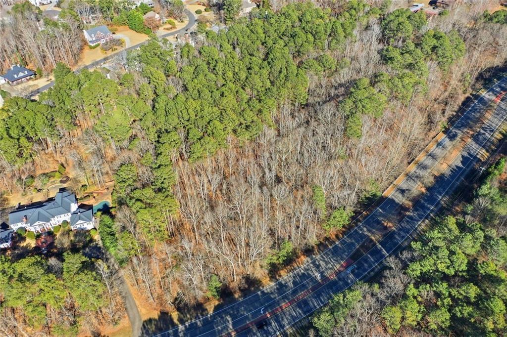 1600 Sixes Road Canton, GA 30114 - Photo 5 of 8 a view of a yard with a tree