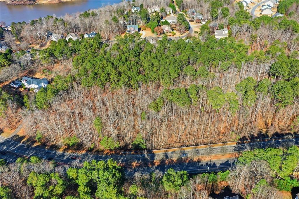1600 Sixes Road Canton, GA 30114 - Photo 6 of 8 a green field with lots of trees