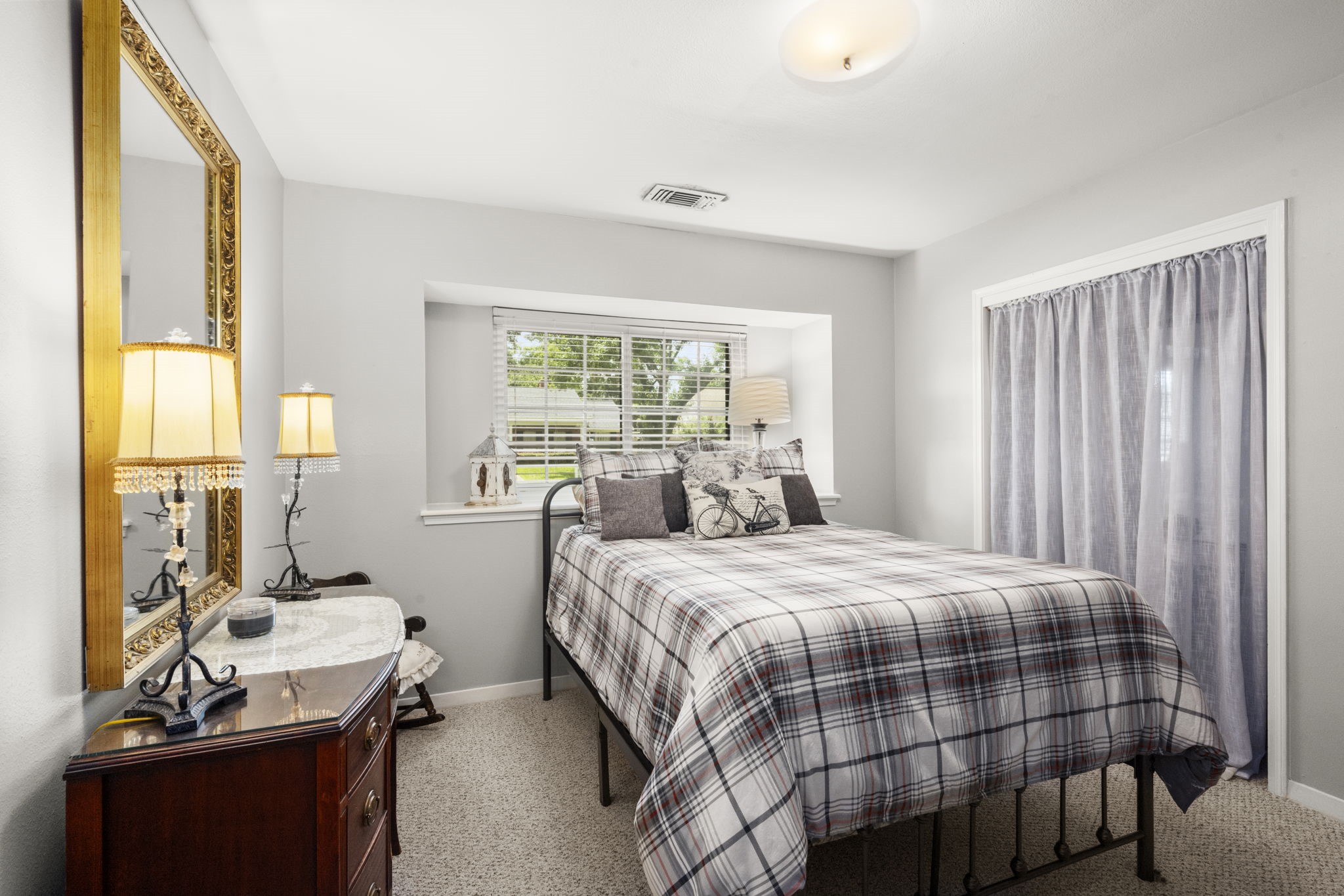 2506 Teague Road Houston, TX 77080 - Photo 11 of 33 a bedroom with a bed and a window