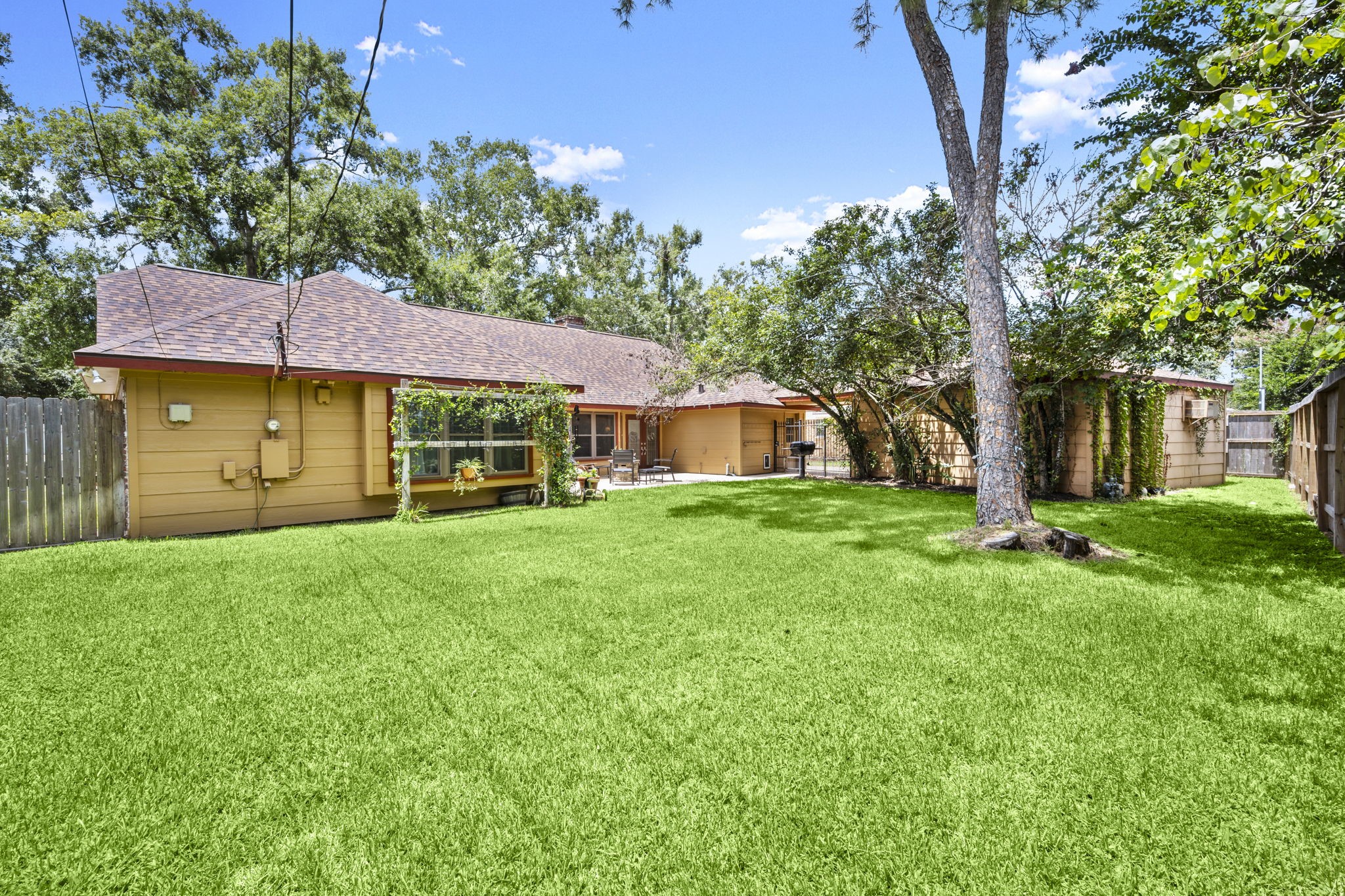 2506 Teague Road Houston, TX 77080 - Photo 14 of 33 a view of an house with backyard space and balcony