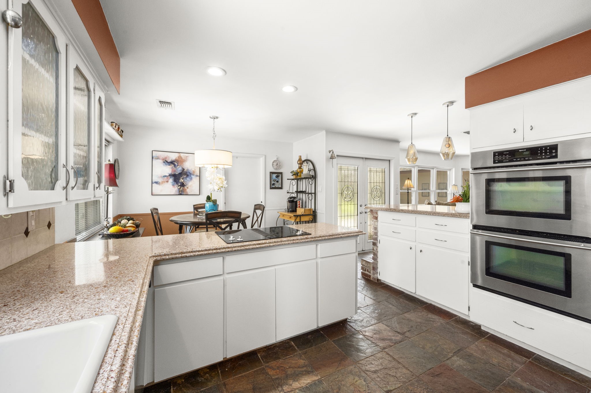 2506 Teague Road Houston, TX 77080 - Photo 21 of 33 a kitchen with sink cabinets and microwave