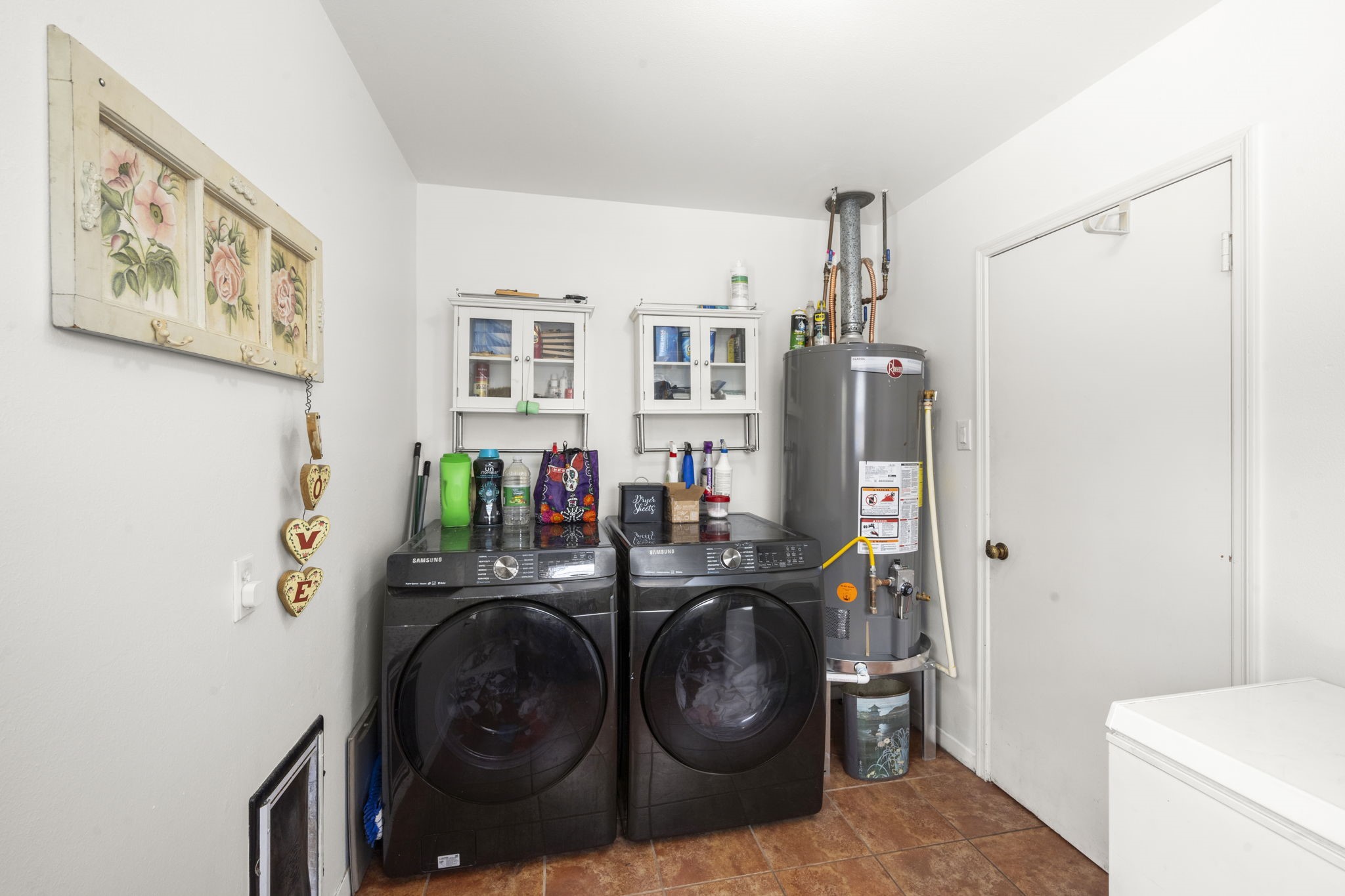 2506 Teague Road Houston, TX 77080 - Photo 23 of 33 a utility room with dryer and washer