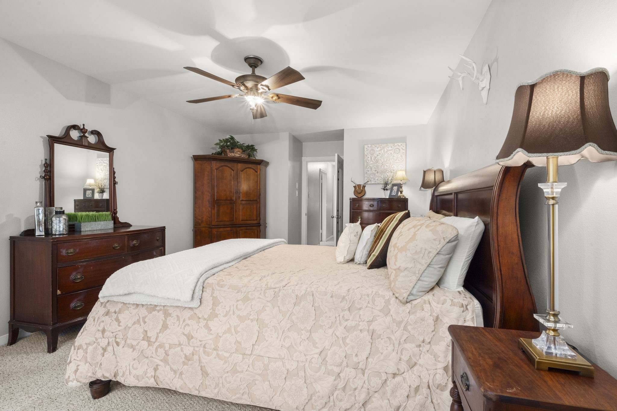 2506 Teague Road Houston, TX 77080 - Photo 25 of 33 a bedroom with a bed and wooden floor