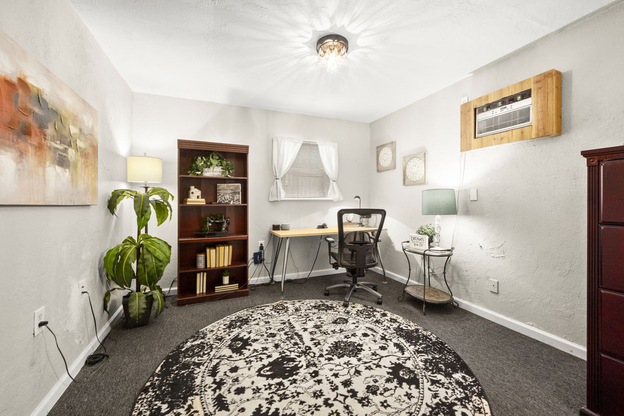 2506 Teague Road Houston, TX 77080 - Photo 28 of 33 a living room with furniture and a rug