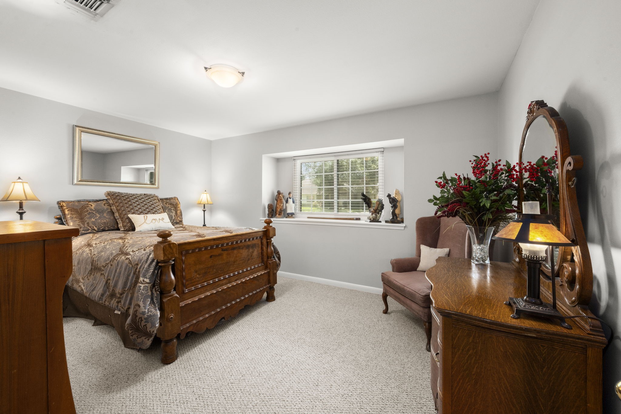 2506 Teague Road Houston, TX 77080 - Photo 10 of 33 a bedroom with a bed chair and window