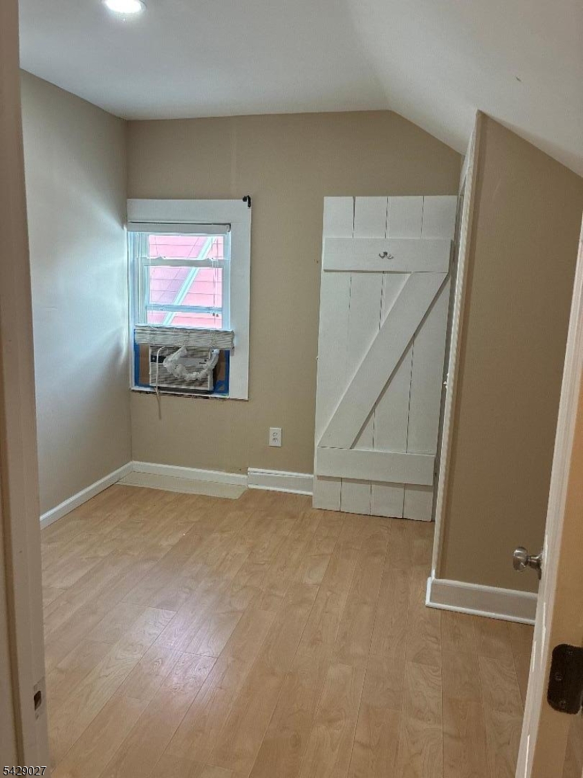 305 Penfield Place Dunellen, NJ 08812 - Photo 6 of 11 a view of an empty room
