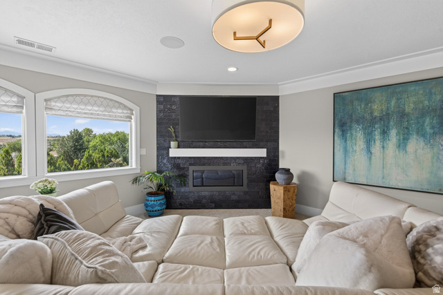 12308 Mariah Circle Draper, UT 84020 - Photo 64 of 293 Flex room off of the Primary Suite with a contemporary fireplace featuring dark tile surround and a white mantel