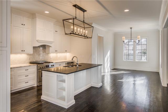 155 Cheek Road Nashville, TN 37205 - Photo 6 of 20 This open concept gourmet kitchen boasts custom cabinetry, professional series appliances,granite counters and backsplash