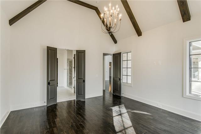 155 Cheek Road Nashville, TN 37205 - Photo 8 of 20 This amazing master bedroom space has 12 ft ceilings with rustic beams and beautiful natural light.