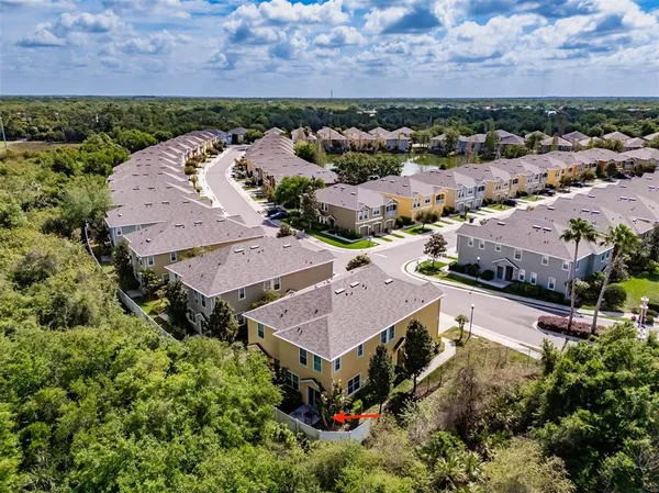 an aerial view of a house with a garden
