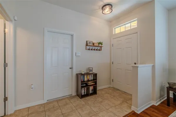 a view of room with workspace and a window