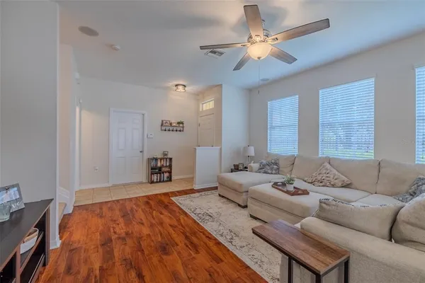 a bedroom with furniture and a chandelier
