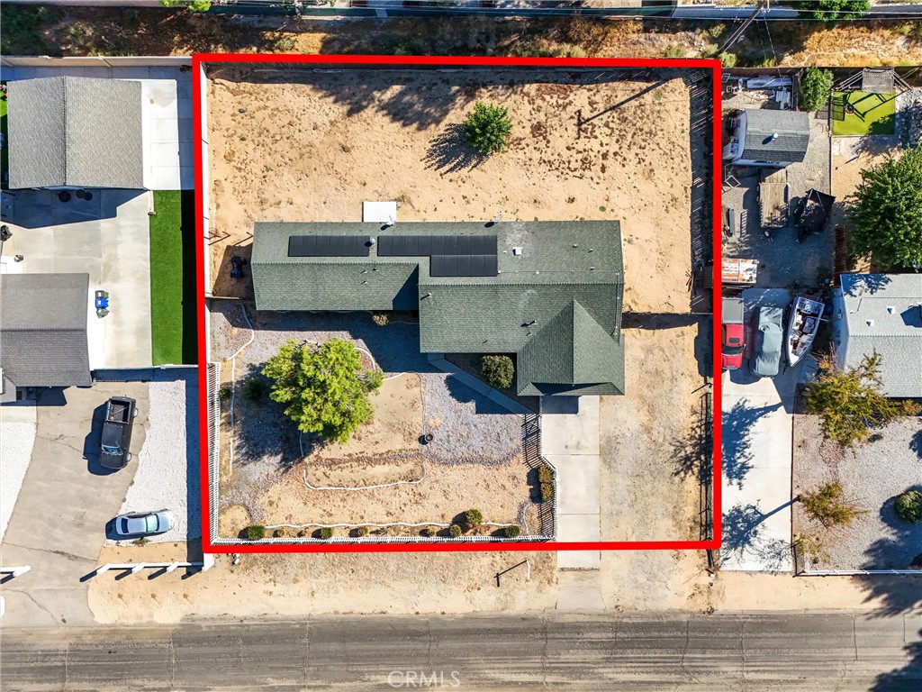 19181 Haida Road Apple Valley, CA 92307 - Photo 1 of 1 a view of a street with cars on road