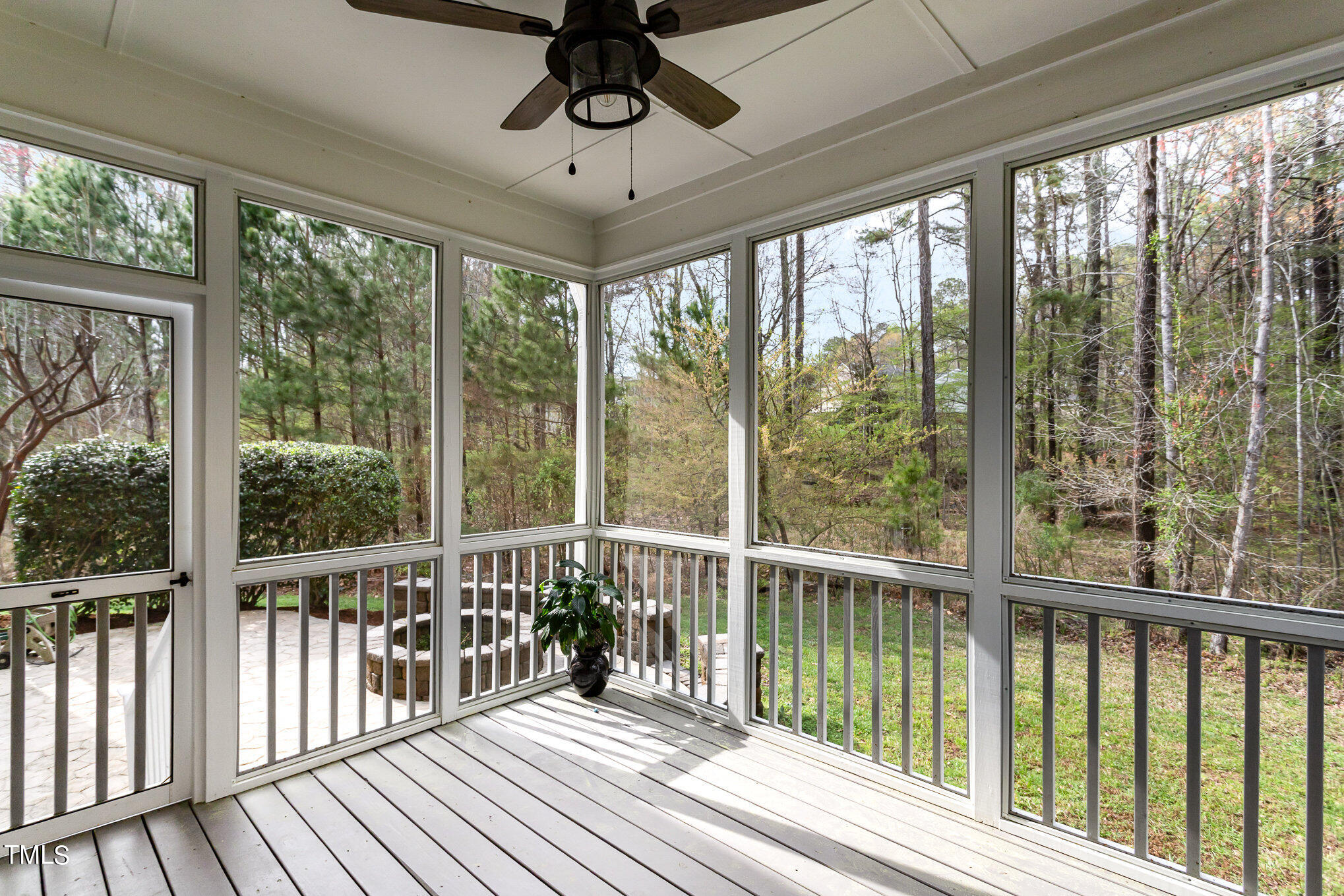 10201 Darling Street Raleigh, NC 27613 - Photo 21 of 23 a view of a balcony with wooden floor and outdoor space