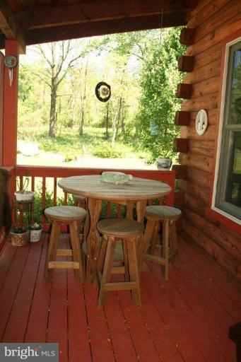 18399 Blue Ridge Mountain Road Bluemont, VA 20135 - Photo 22 of 26 a view of a chairs and table in the balcony