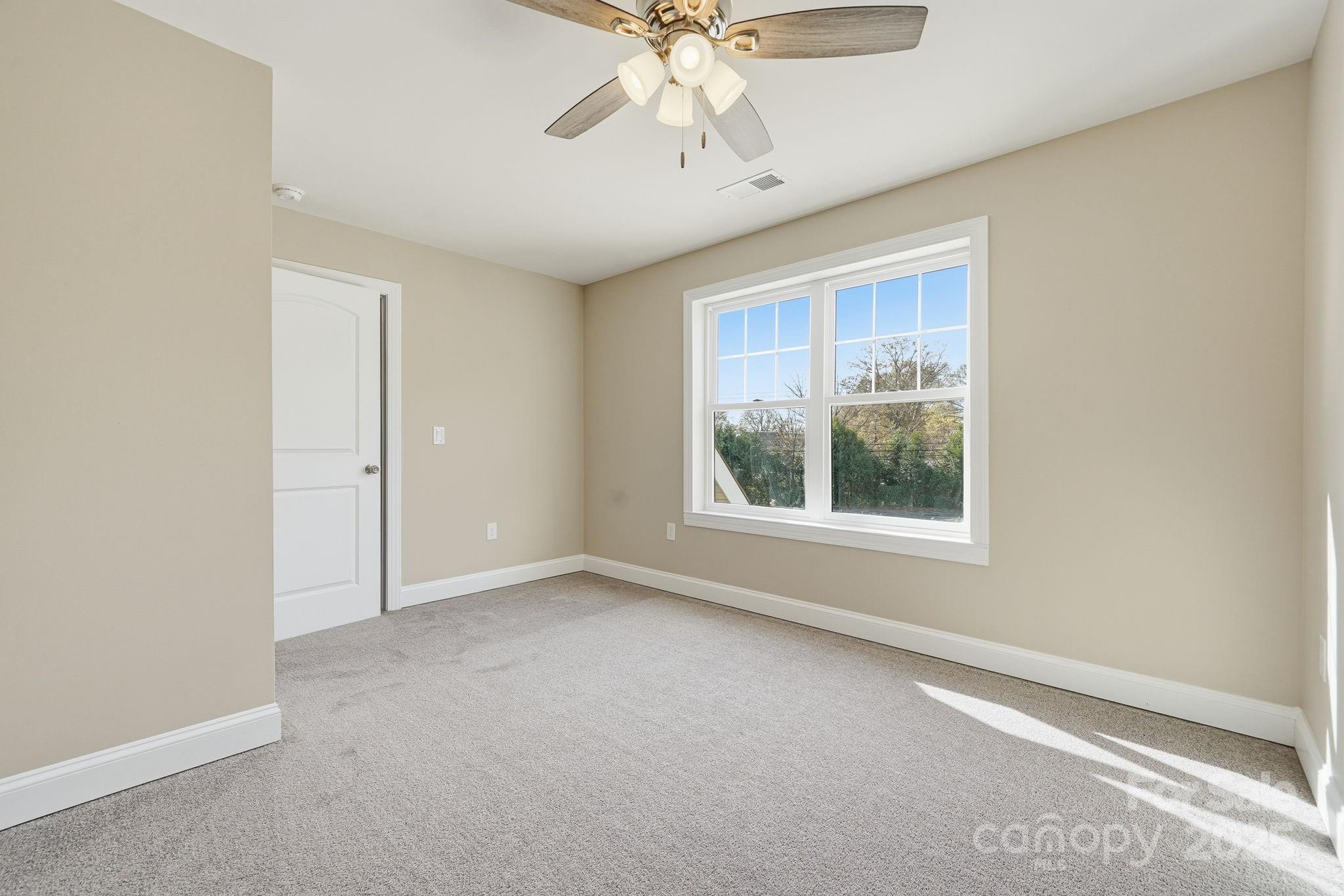 101 McAlway Road Charlotte, NC 28211 - Photo 16 of 40 an empty room with a window