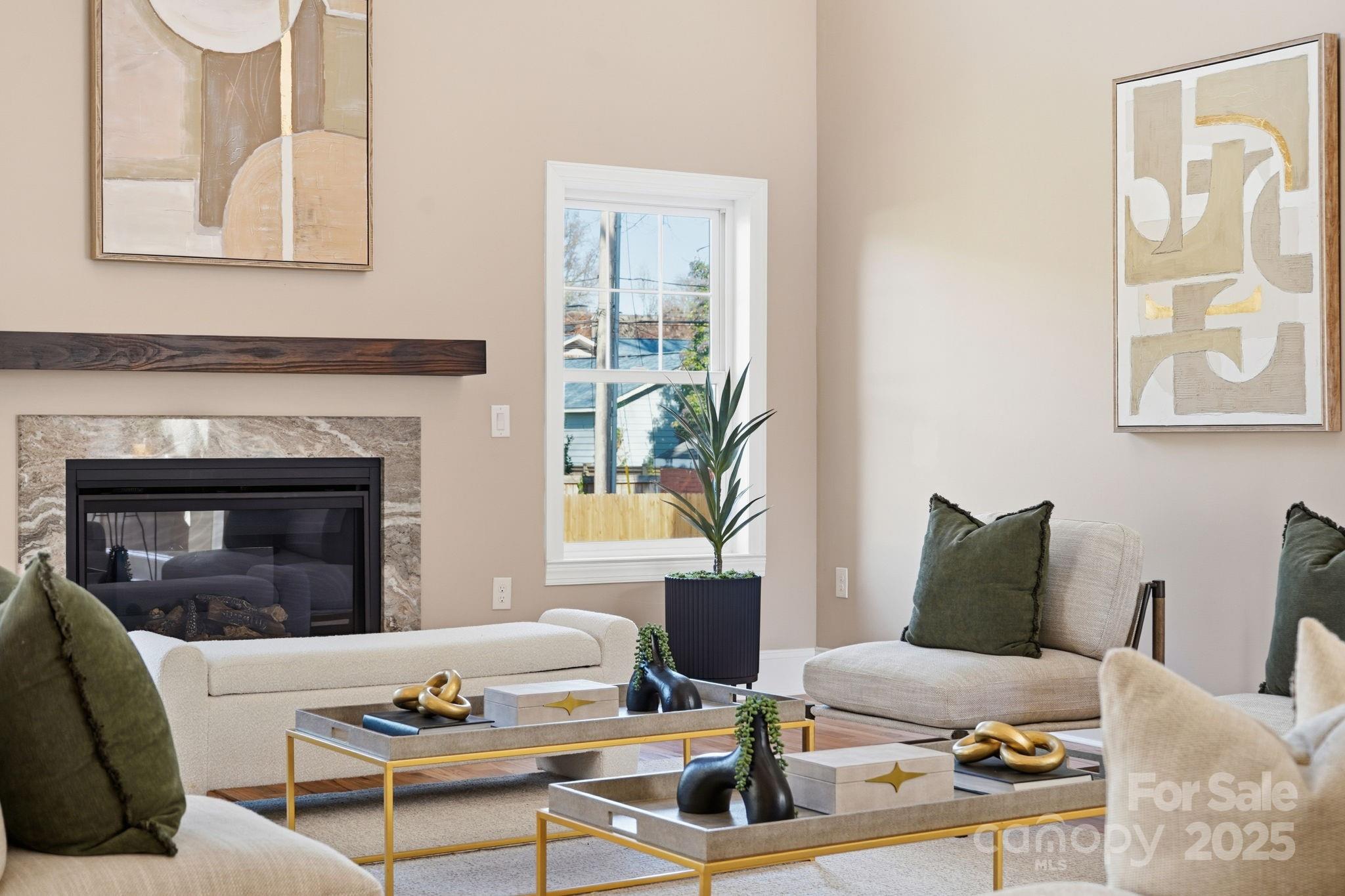 101 McAlway Road Charlotte, NC 28211 - Photo 34 of 40 a living room with furniture and a fireplace