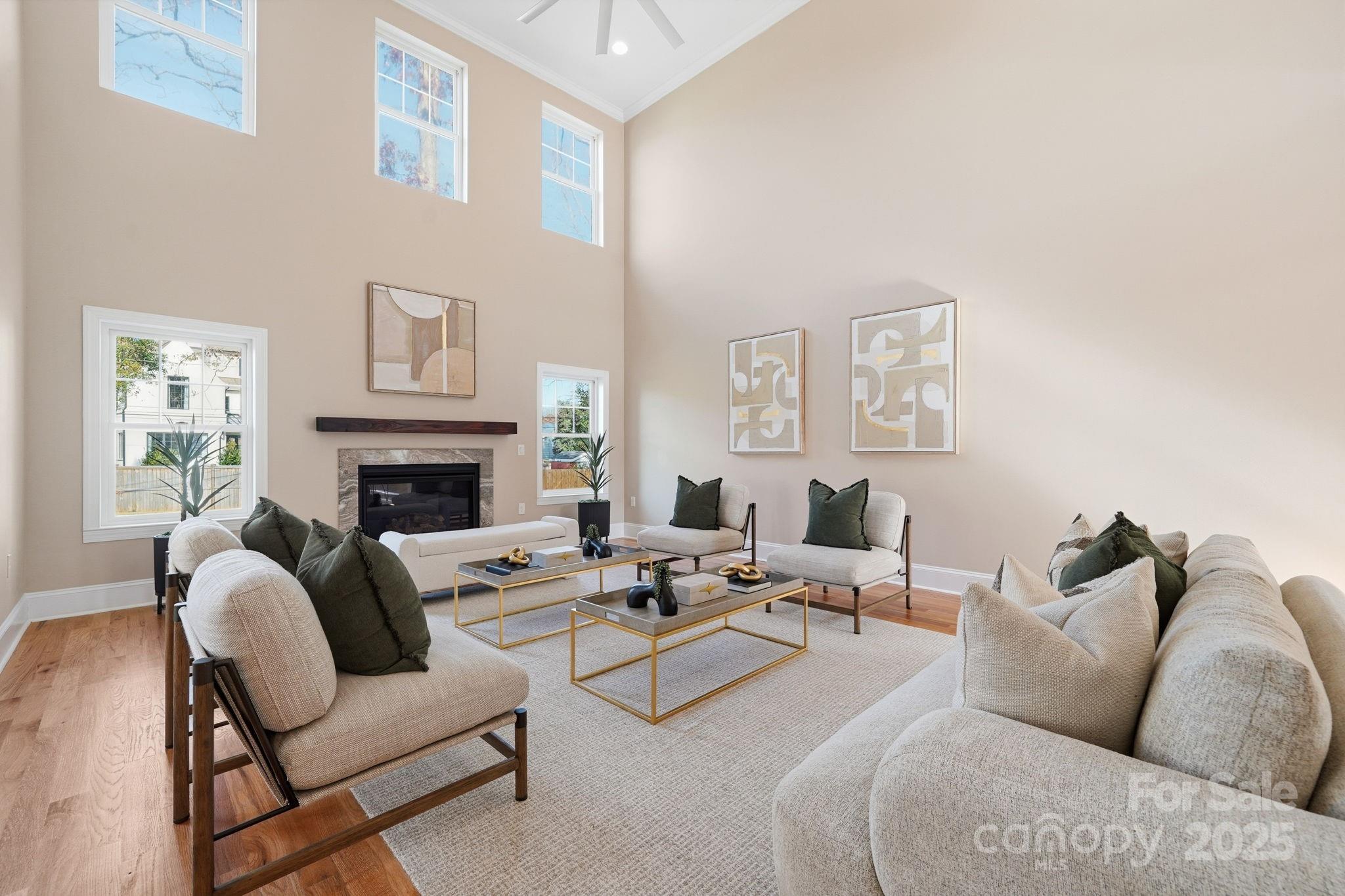 101 McAlway Road Charlotte, NC 28211 - Photo 37 of 40 a living room with furniture fireplace and a window