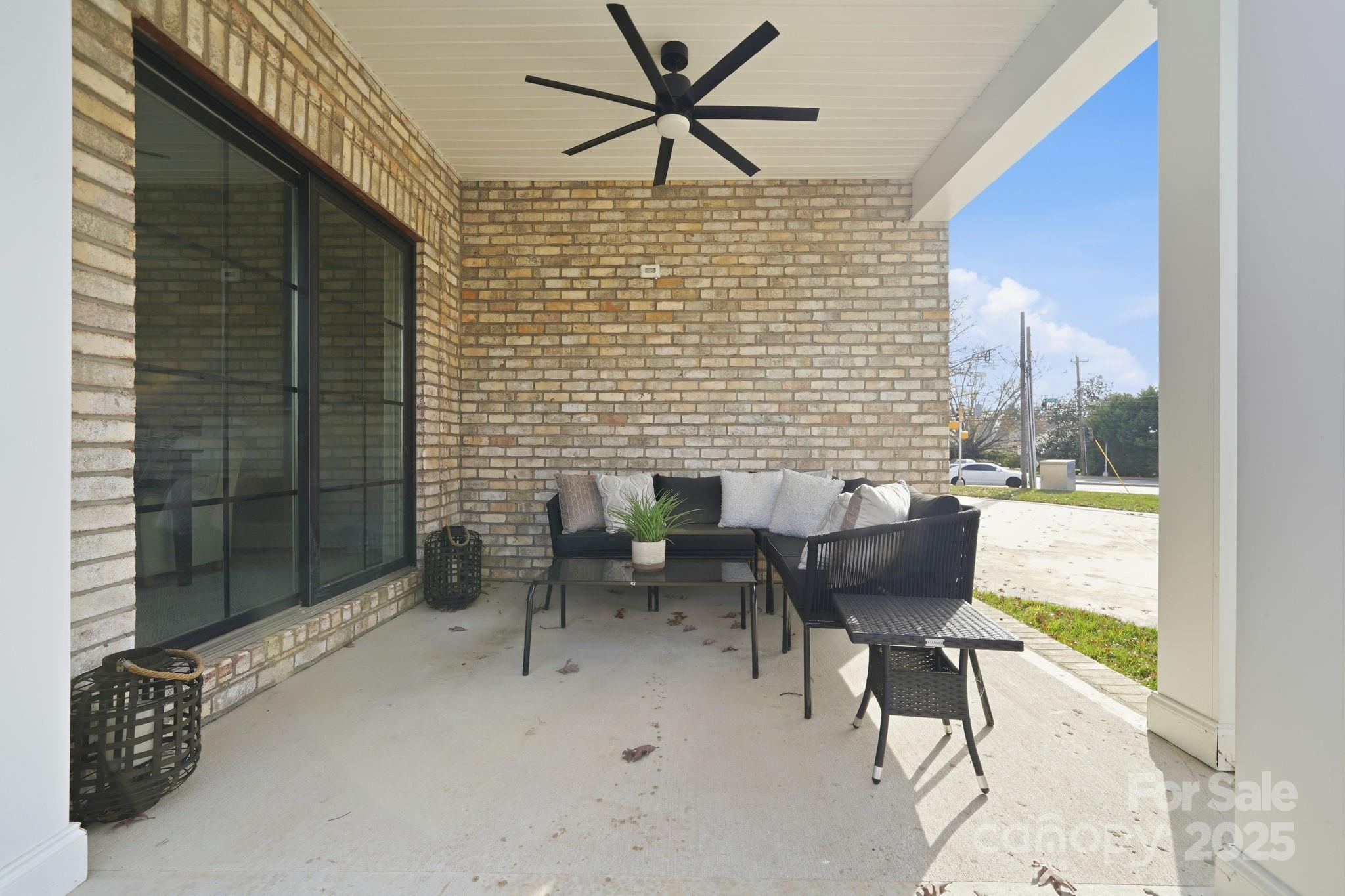 101 McAlway Road Charlotte, NC 28211 - Photo 4 of 40 a balcony with table and chairs