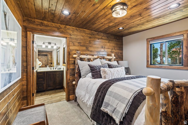 2031 South Quakie Road Koosharem, UT 84744 - Photo 14 of 33 Wood-paneled walls and ceiling, recessed lighting, and a wood-framed window