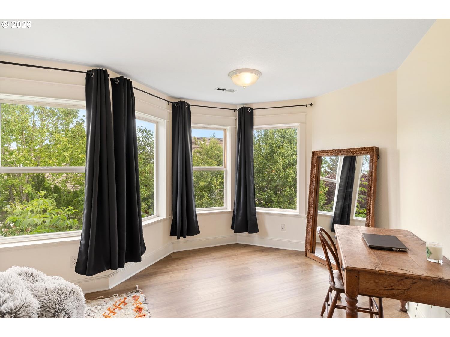 2519 Northwest 24th Circle Camas, WA 98607 - Photo 30 of 48 a view of a room with a large window and wooden floor