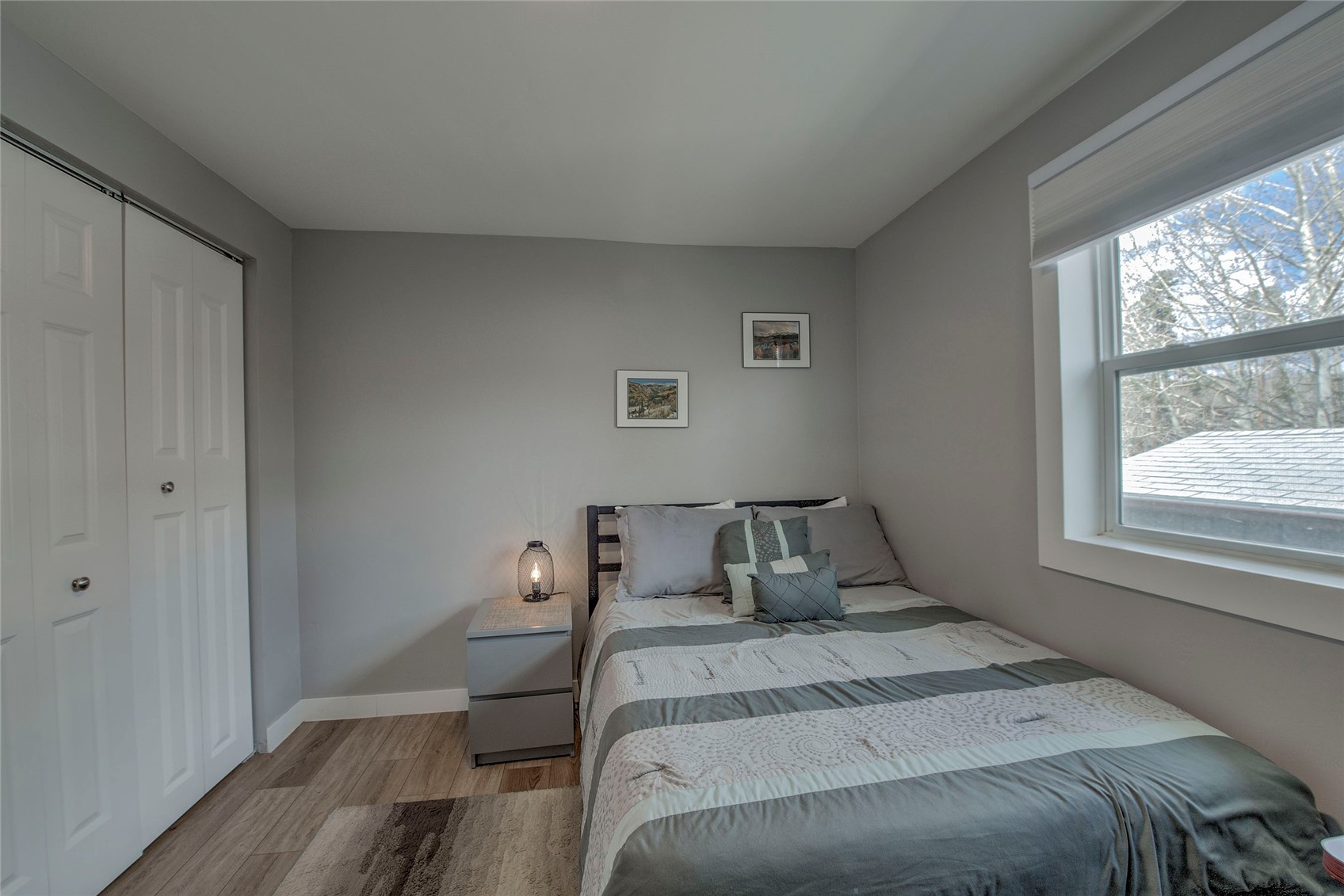 472 Ryan Gulch Road Silverthorne, CO 80498 - Photo 14 of 36 a bedroom with a bed and window