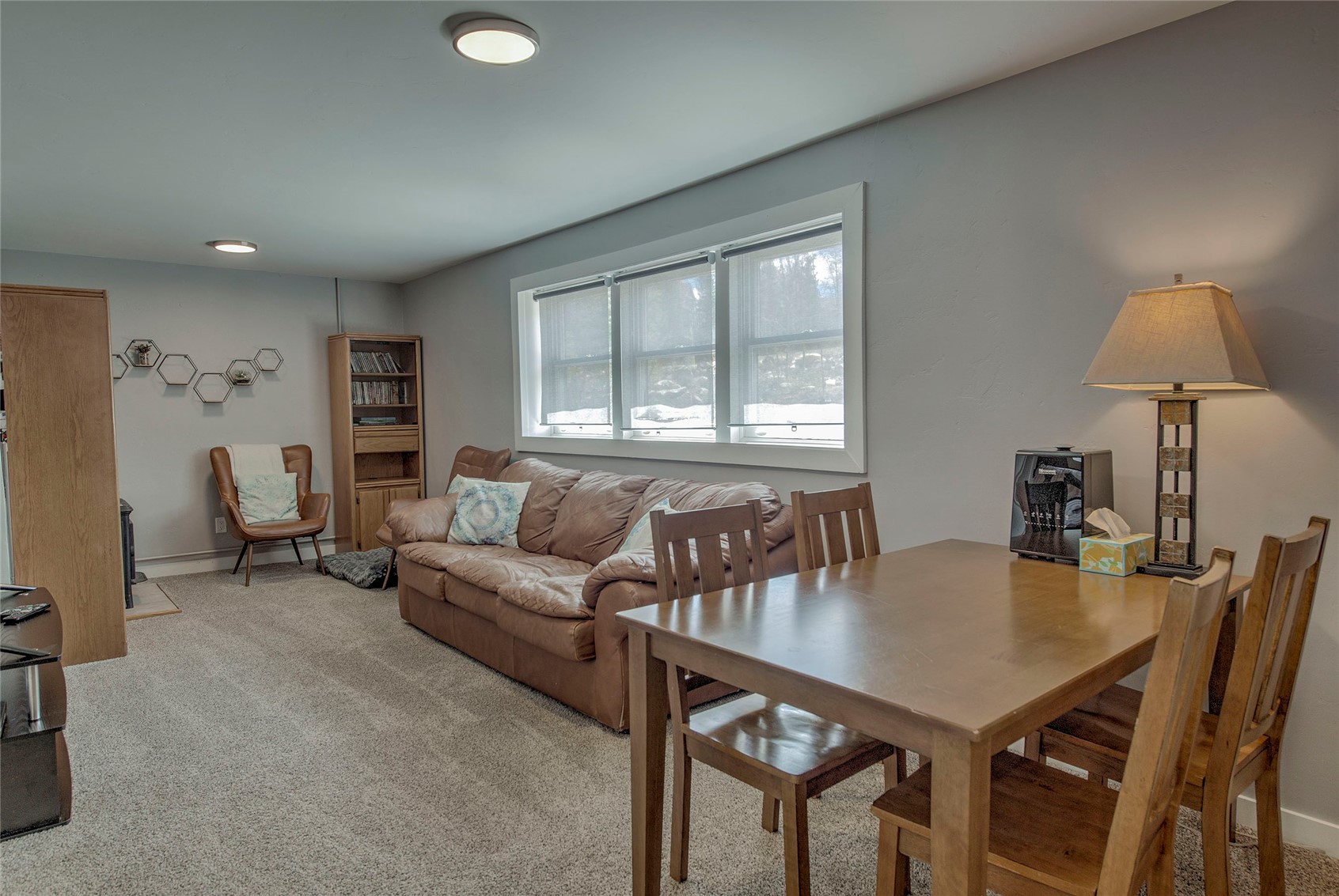 472 Ryan Gulch Road Silverthorne, CO 80498 - Photo 17 of 36 a living room with furniture a window and a table