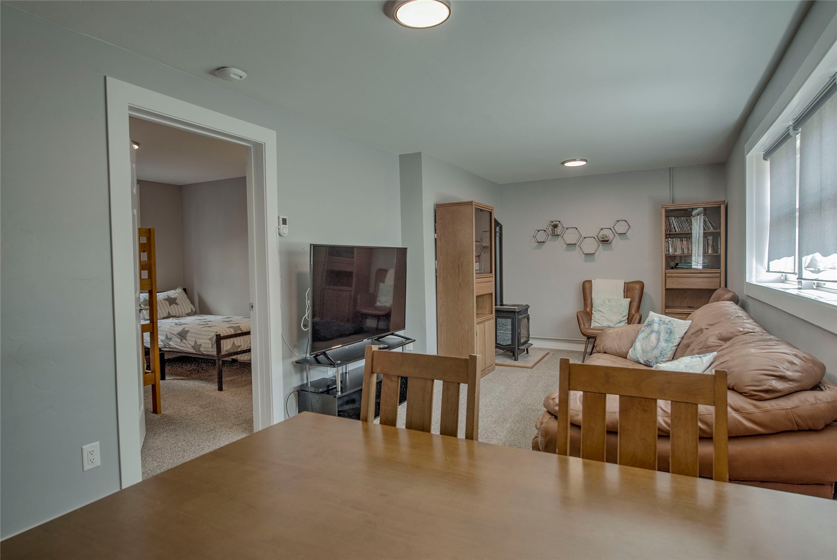 472 Ryan Gulch Road Silverthorne, CO 80498 - Photo 18 of 36 a living room with furniture and a flat screen tv